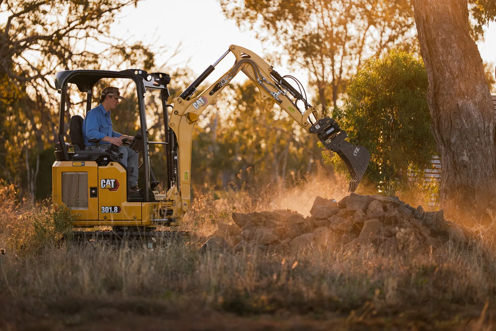 Excavator at work for Keutmann Equipment at sunset