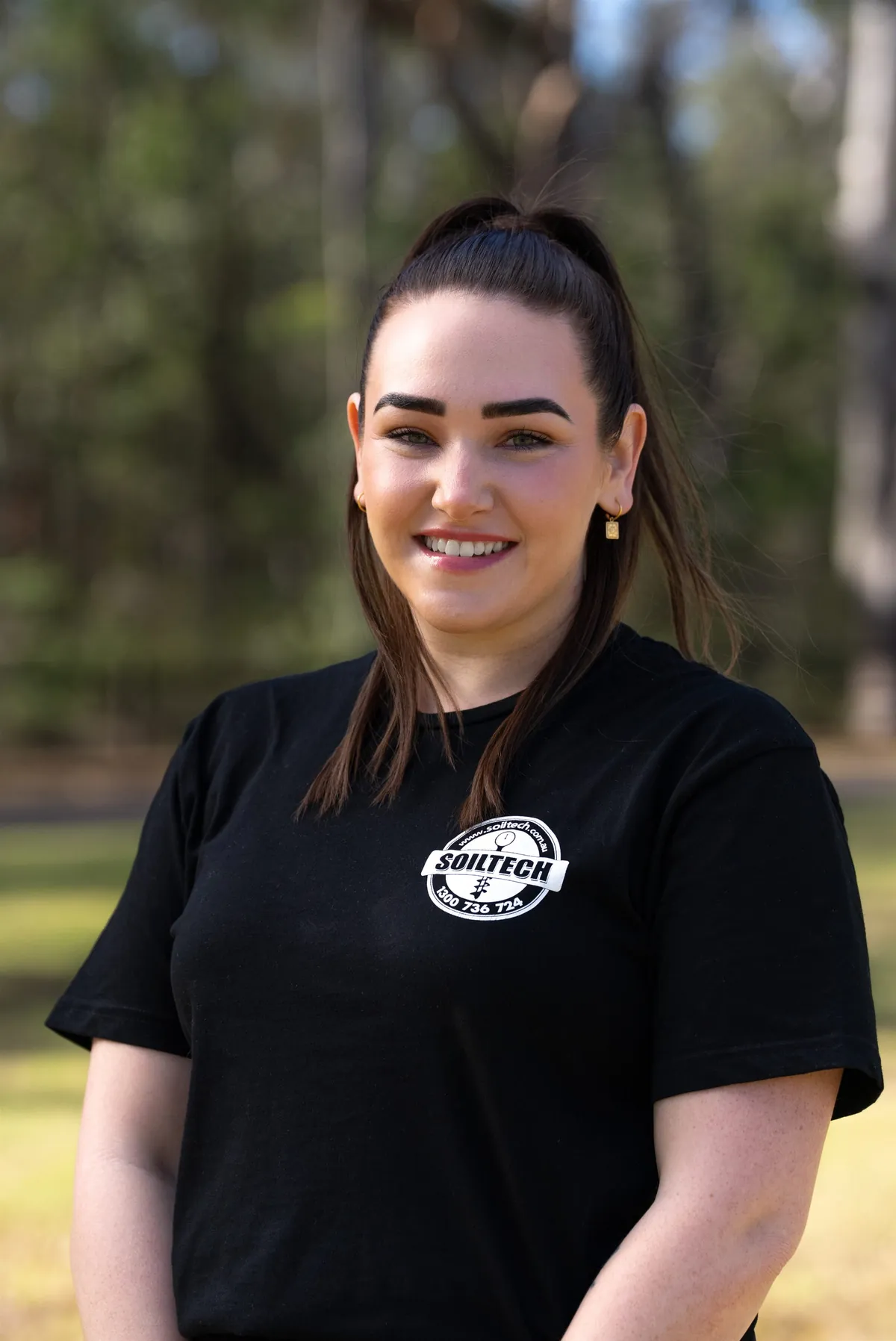 Soiltech team member in an outdoor business headshot